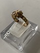 Fine, discreet 
ladies' ring, 
with a 
beautiful motif 
of a flower 
with a white 
stone in the 
...