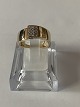 Beautiful gold 
ring with 
inlaid 
diamonds. This 
ring can be 
worn either 
alone or in 
combination ...