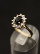 14 carat gold 
ring size 58 
with amethyst 
surrounded by 
clear stones 
item no. 587140