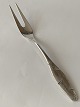 Meat fork 
#Diamond 
#Silver spot
Length 21 cm
Produced by 
O.V. Mogensen.
Nice used ...