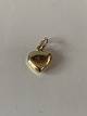 Beautifully 
executed gold 
heart, with a 
simple pattern 
in 14 carat 
gold. This 
small pendant 
is ...