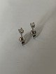 Nice little 
studs in 14 
carat gold, 
with inlaid 
brilliant. The 
ear studs are 
small and 
discreet, ...