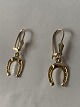 Beautiful 
Horseshoe 
earrings, and 
with a large 
earring in 14 
carat gold. 
These earrings 
are very ...