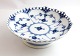 Royal 
Copenhagen. 
Blue fluted, 
full lace. 
Small round 
bowl on foot. 
Model 1023. 
Height 6 cm. 
...