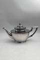 August Thomsen 
Silver Tea Pot 
(1919) Measures 
H 16 cm (6.29 
inch) L 29 cm 
(11.41 inch) W 
12.5 cm ...