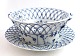 Royal 
Copenhagen. 
Blue fluted, 
full lace. 
Round fruit 
bowl with 
saucer. Model 
(1050 + 1099). 
...