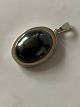 Pendant in 
silver with 
inlaid 
Bloodstone.
Height with 
awl: 27.35 mm
Width: 15.10 
mm
Stamped ...