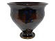 Kähler art 
pottery vase 
with dark blue 
and dark brown 
colors.
The vase was 
produced in the 
...