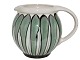 Kähler art 
pottery, small 
pitcher with 
green stripes.
The vase was 
produced in the 
early ...