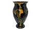 Kähler art 
pottery vase 
with yellow, 
blue and green 
colors.
The vase was 
produced in the 
...