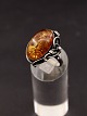 Sterling silver 
ring size 56 
with amber 2.2 
x 1.6 cm. Item 
No. 588650