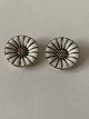 Beautiful ear 
clips in 
classic daisy, 
made in 
sterling silver 
by Anthon 
Michelsen. The 
motif is ...