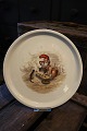 Royal 
Copenhagen 
plate / dish in 
a Christmas 
dinner set with 
a Christmas 
motif of an elf 
and a ...