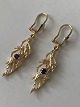 Gold earrings in 14 carat gold, with purple stones and ...