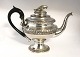 Erik Christensen Lind, Horsens. Silver teapot (830). Decorated with a bird on 
the lid. Height 20 cm. Produced approx. 1860.