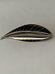 This beautiful 
brooch in 
sterling silver 
is made in a 
simple pattern, 
with a leaf. 
The soft ...