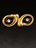 14 carat gold brooch with 2 zircons