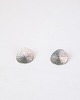 Set of tin ear 
clips/earrings, 
designed by 
Jørgen Jensen 
in the 1960s. 
Jørgen Jensen, 
known for ...