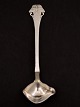 Silver 
cream/dressing 
spoon 14.5 cm. 
with butterfly 
subject no. 
590399