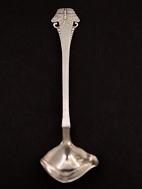 Silver cream/dressing spoon