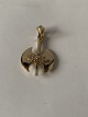 Pendant in 14 carat gold, shaped like a double axe.
