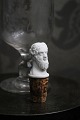 19th century 
wine stopper 
from Royal 
Copenhagen in 
the shape of a 
man's bust in 
biscuit with 
...