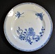 Chinese blue 
painted plate, 
approx. 1780. 
Kangxi. 
Decorated with 
flowers and 
butterflies. 
...