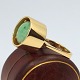 Flemming Lund; A 14k gold ring set with jade