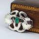 Bernhard Hertz 
jewelry.
Bernhard 
Hertz; A Danish 
Art Nouveau 
brooch of 
silver adorned
with ...