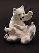 Royal 
Copenhagen 
figure no. 1107 
l. assortment 
playful bears 
designed by 
Knud Kyhn. 
Height 13.5 ...