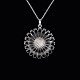 Georg Jensen. 
Sterling Silver 
Daisy Pendant 
with black 
Enamel 33mm.
Crafted by 
Georg ...