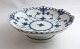 Royal 
Copenhagen. 
Blue fluted, 
full lace. 
Small round 
bowl on foot. 
Model 1023. 
Height 6 cm. 
...