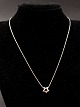 Sterling silver 
necklace 42 cm. 
with star 
pendant D. 1 
cm. items no. 
592513