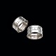 Georg Jensen. A 
pair of 
Sterling Silver 
Napkin Rings 
#87.
Designed by 
Georg Jensen 
(1866-1935) ...