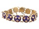 Sporrung Sweden
Gilded silver bracelet with blue enamel royal crowns