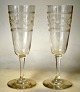 Champagne 
flutes, 20th 
century. With 
belt 
decorations and 
vine leaves. 
H.: 18 cm.
Currently 9 
...