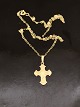 8 carat gold 
Dagmar cross 
1.9 x 1.4 cm. 
and 8 carat 
gold chain 41 
cm. from 
goldsmith 
Herman ...