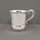 A children cup 
of hammered 
hallmarked 
silver, 1930.
H. 7 cm. Diam 
6,7 cm.
A Danish 
children ...