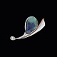 Birgitte Munch. 
Sterling Silver 
Brooch with 
Spectrolite, 
Gold and Topaz.
Sterling 
Silver Brooch 
...