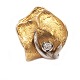 Ole Lynggaard 
clasp 14kt gold 
with a diamond 
of ca. 0,07ct
Size: 20x18mm