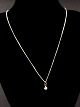 Sterling silver 
necklace 45 cm. 
with small 
pendant with 
clear stone 
item no. 594333