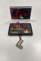 Georg Jensen 
Gift Tag - 
Christmas Sock 
with Hearts. 
Box with 3 pcs. 
and 1 extra. 
Gilded brass. 
...