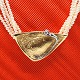 Ole Lynggaard; Clasp of 14k gold  and white gold with a ...