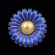 Georg Jensen. 
Gilded Silver 
Daisy Brooch / 
Pendant with 
Blue Enamel. 
50mm
Produced to 
celebrate ...
