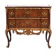 Padouk veneered 
and partly gilt 
marble top 
commode made 
...