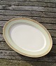 Dagmar with 
gold rim China 
porcelain 
dinnerware by 
Royal 
Copenhagen, 
Denmark. 
Large serving 
...