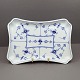 Royal 
Copenhagen,
Blue Fluted 
porcelain;
A tray, #269.
First. L. 22,5 
cm. W. 14,5 cm.
Royal ...