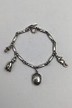 Georg Jensen 
Sterling Silver 
Bracelet No. 43 
w Charms 
Measures 19 cm 
(7.48 inch) 
Weight 24.1 gr 
...