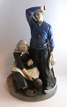 Royal 
Copenhagen. 
Porcelain 
figure. Harvest 
people. Model 
1352. Height 43 
cm. (1 
quality).