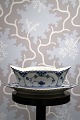 Royal 
Copenhagen Blue 
Fluted Full 
Lace sauce bowl 
on fixed 
saucer.
Decoration 
number: 1/1105. 
...